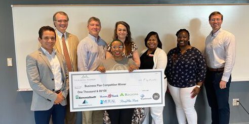 Business Plan Competition Winner Spring 2021 Spring 2021 Entrepreneur Boot Camp Winner with check